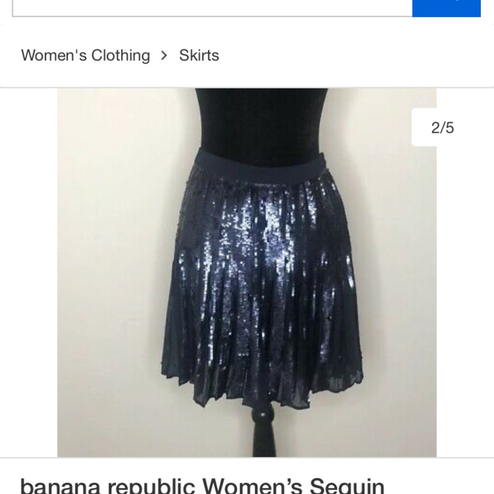 Blue sequined skirt with pleats